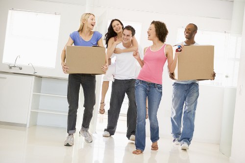 Removals team handling a move in a Canary Wharf apartment building