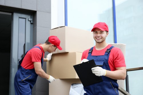 Office relocation planning in Canary Wharf with moving boxes and office furniture