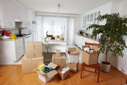 Mover wearing protective gloves handling furniture safely