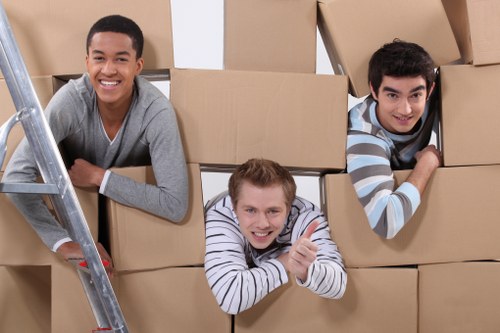 Packed boxes and furniture staged for a move near Canary Wharf