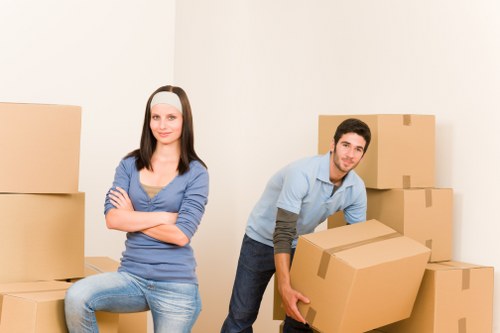 Local moving van helping with furniture transport in Canary Wharf