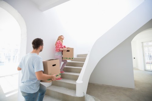High-rise residential move in Canary Wharf with local access planning