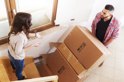Local moving team preparing items in a Canary Wharf property