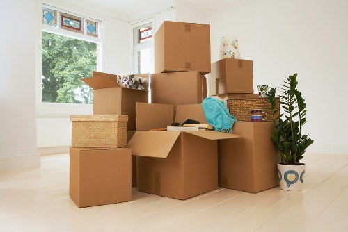 Loading office equipment for relocation near Canary Wharf commercial buildings