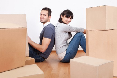 Removal van helping with residential and office relocations in Canary Wharf