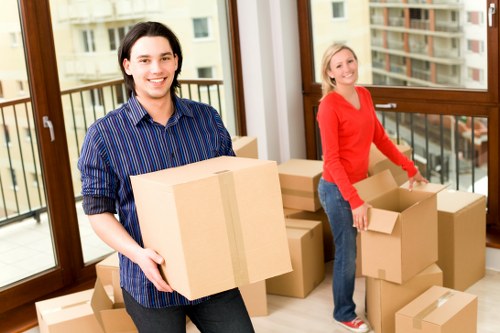 Staff carrying items carefully in a residential move